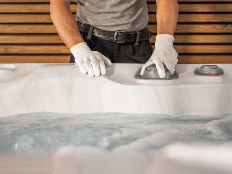 Hot,Tub,Technician,Worker,Performing,Outdoor,Spa,Installation,Close,Up