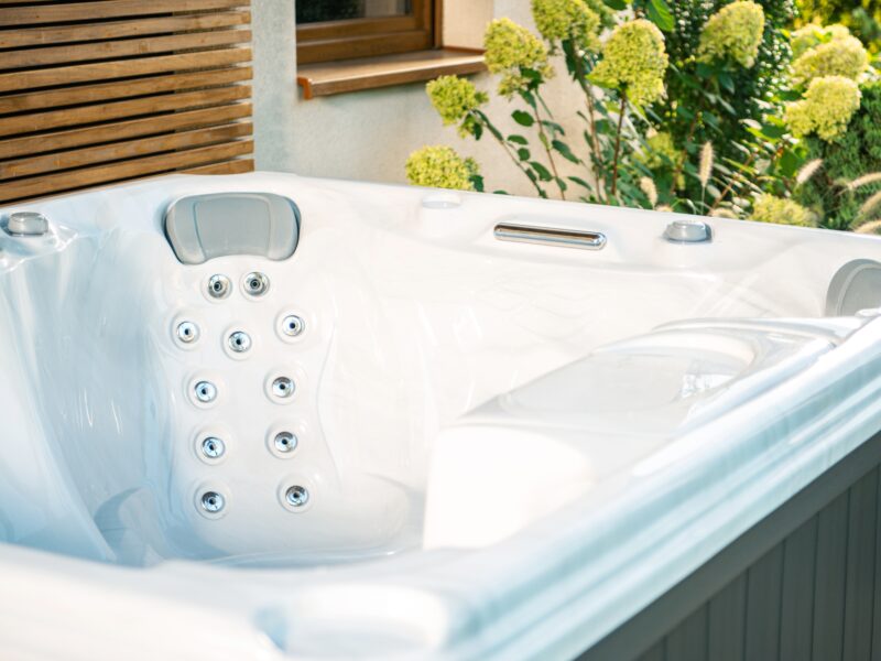 A,Luxurious,Hot,Tub,Sits,Invitingly,Outdoors,With,A,Picturesque