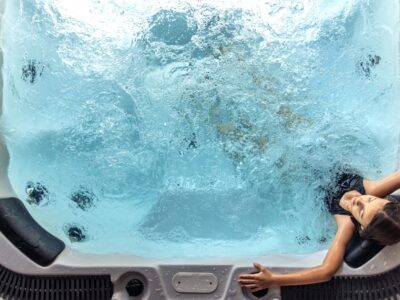 Girl,In,Spa,Hot,Tub,Seen,From,Above,With,Bubbling